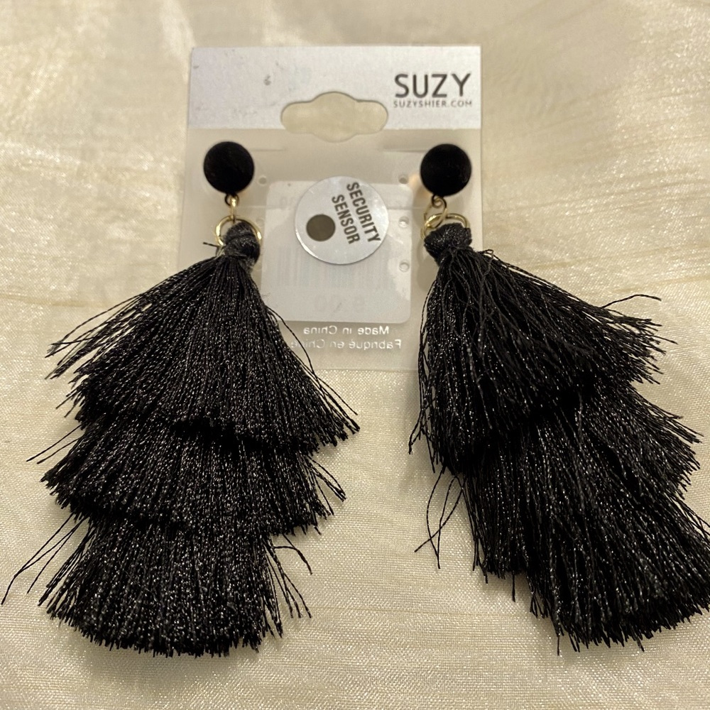 Black dangling earrings from Suzy Sheir. $7.99